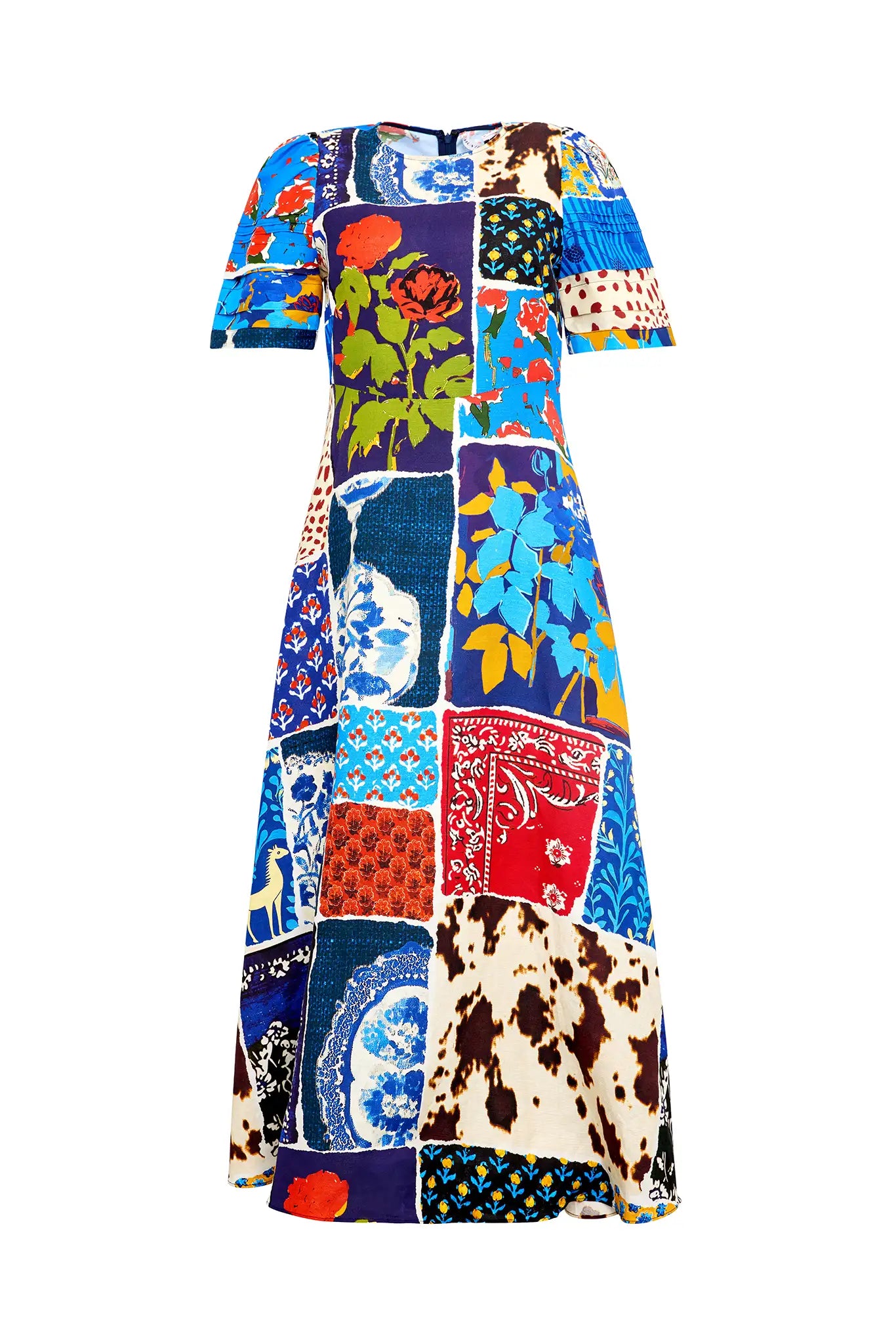 The Casey Dress is a sheath midi with a curved waist seam, relaxed skirt and pleated short sleeves.