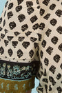 Close up of the Casey Dress in Thistle & Vine Cream.
