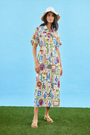 The Charlotte Dress in Coastal Conversation paired with matching two-piece bathing suit