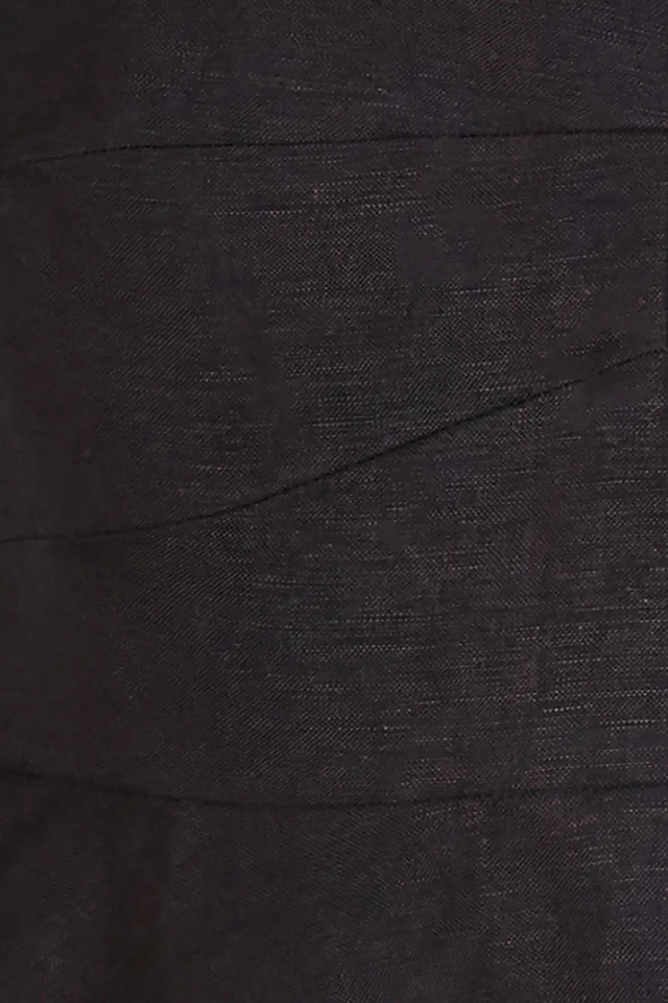 The Chrissy Top is a sleek spaghetti-strap camisole with a seamed bust and a back zipper.