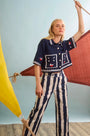 The Clay Top in Deep Sea paired with Juno Pant in Lighthouse Stripe Navy.