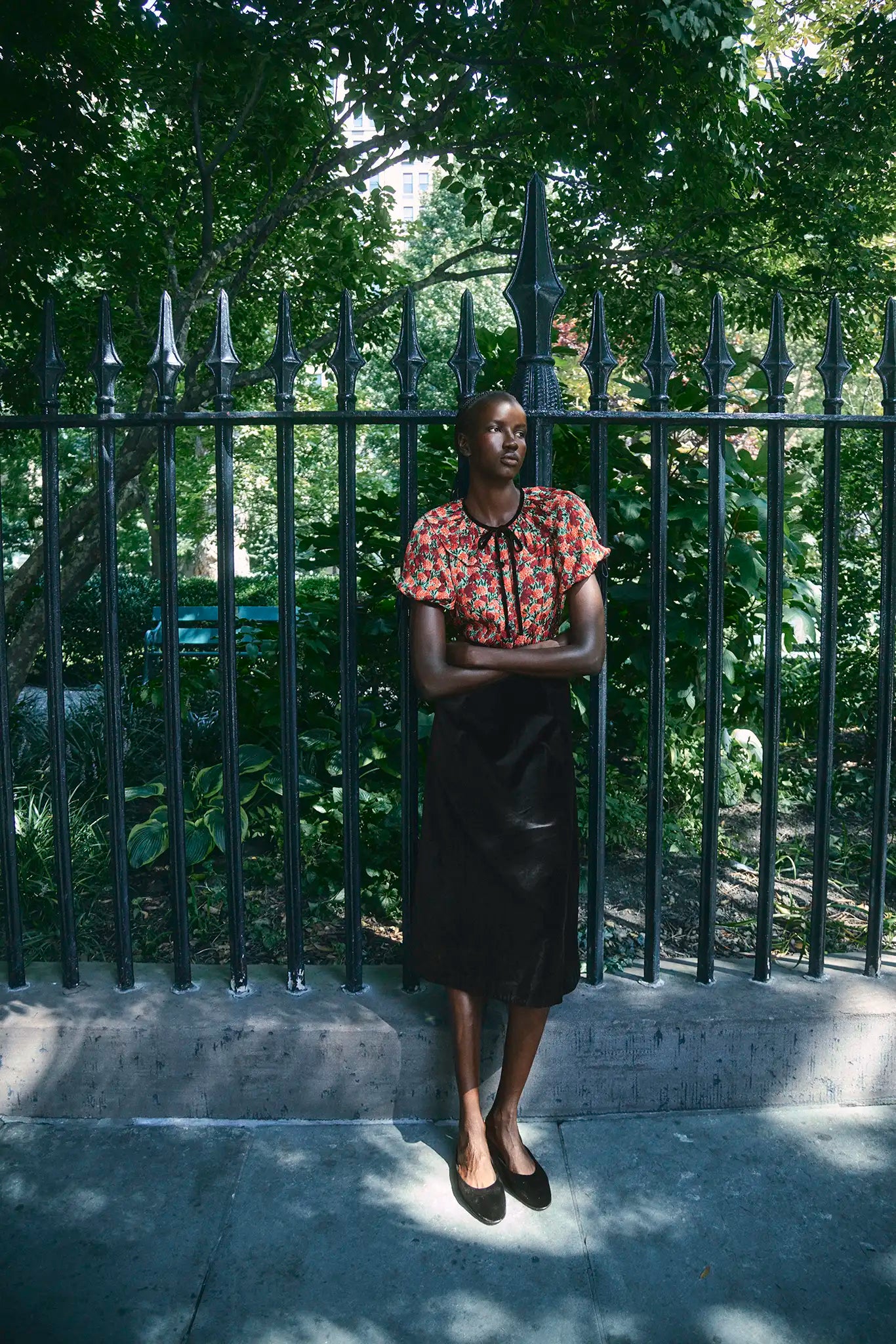The Atlyn Skirt in Velvet Onyx paired with the Connelly Top in Crimson Blossom. 