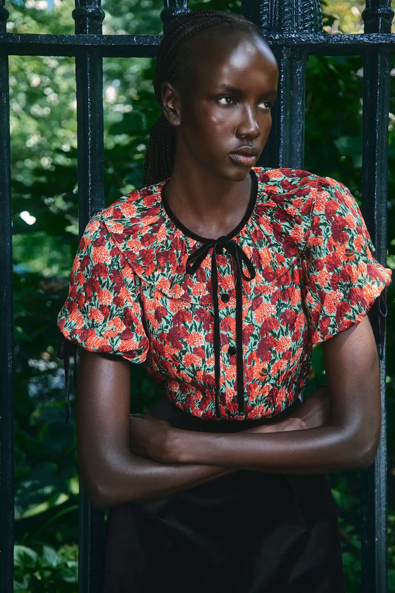 The Connelly Top in Crimson Blossom paired with the Atlyn Skirt in Velvet Onyx. 