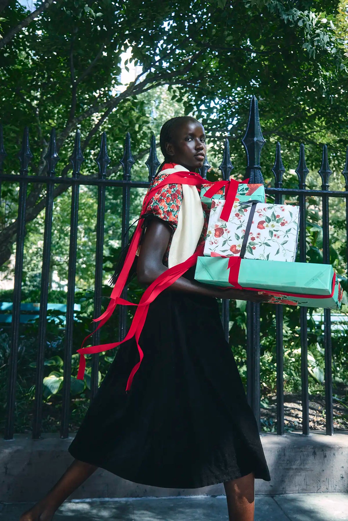 The Atlyn Skirt in Velvet Onyx paired with the Connelly Top in Crimson Blossom. 
