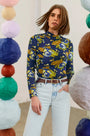 The Connor Top in Primrose paired with the Wray Pant in Washed Blue Denim.