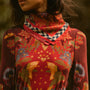 The Scarf in Birds of a Feather Maroon paired with the matching Connor Top and Wimberley Skirt. 