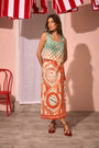 The Corby Top in Coral Reef Ombre paired with Paloma Wrap Skirt in Lost at Sea print.