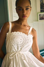 The Cosette Dress in Battenberg Cotton Lace has a relaxed silhouette and drawcord waist