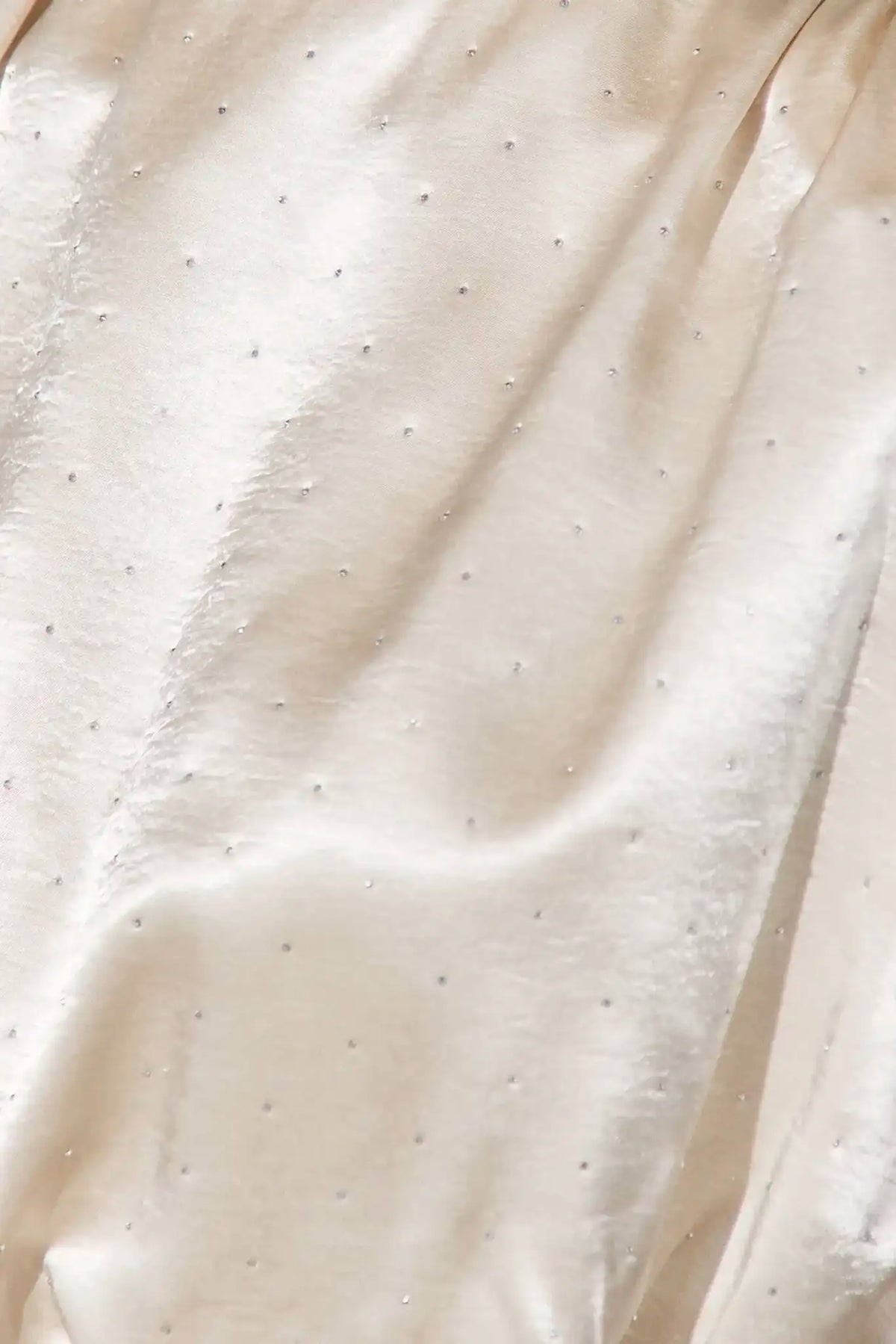 Close up of the Cosima Top in Champagne on Fifth.