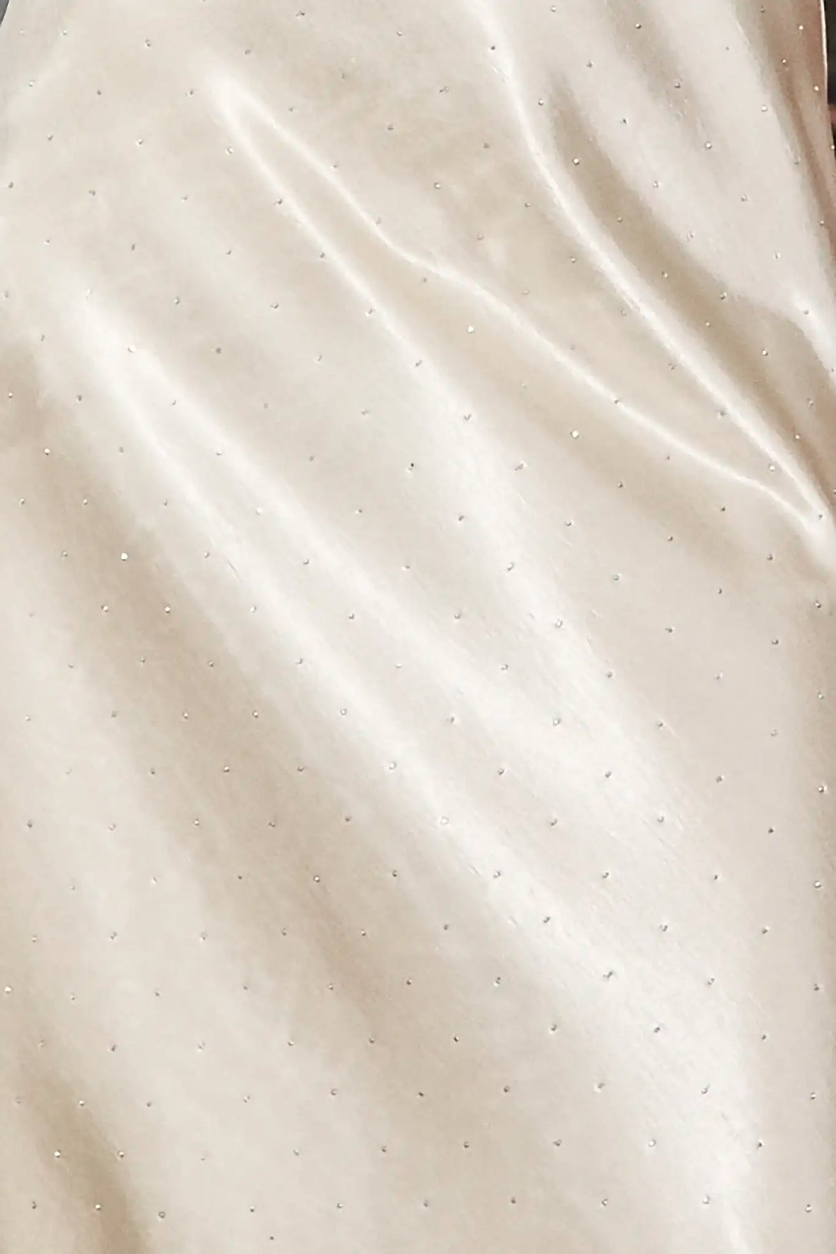 Close up of the Suki Skirt in Champagne on Fifth.