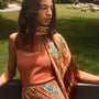 The oversized scarf in Amber Glen Brown paired with matching Allyne skirt and Davis Cami in Rust.