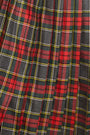 The Dominic Skirt has a banded waist and a straight pleated silhouette finished with front slits. 