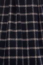 Close up of the Queenby Skirt in St. Andrews Check. 