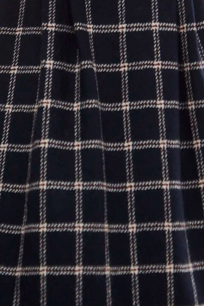 Close up of the Queenby Skirt in St. Andrews Check. 