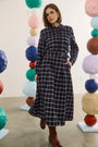 The Dorrington Jacket in St. Andrews Check paired with matching Queenby Skirt.