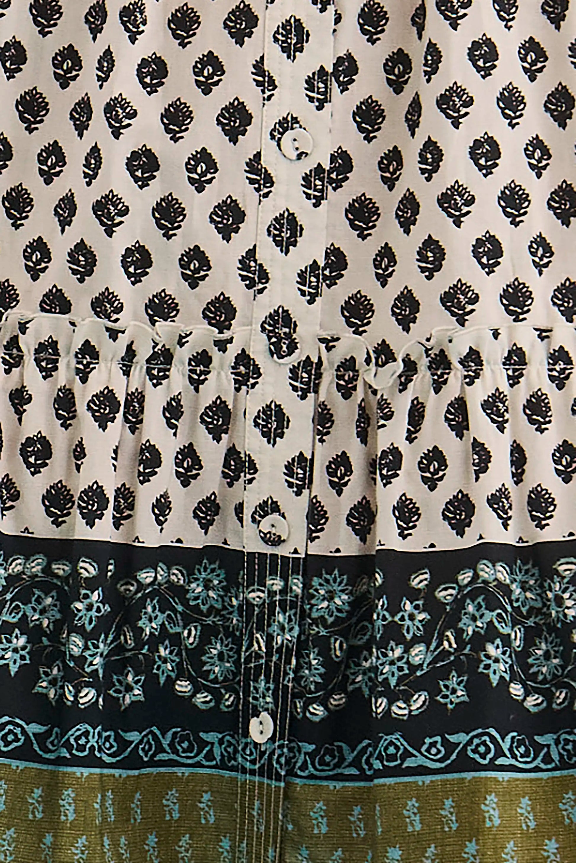 Close up of the Drifter Mini Dress in Thistle & Vine Cream. 