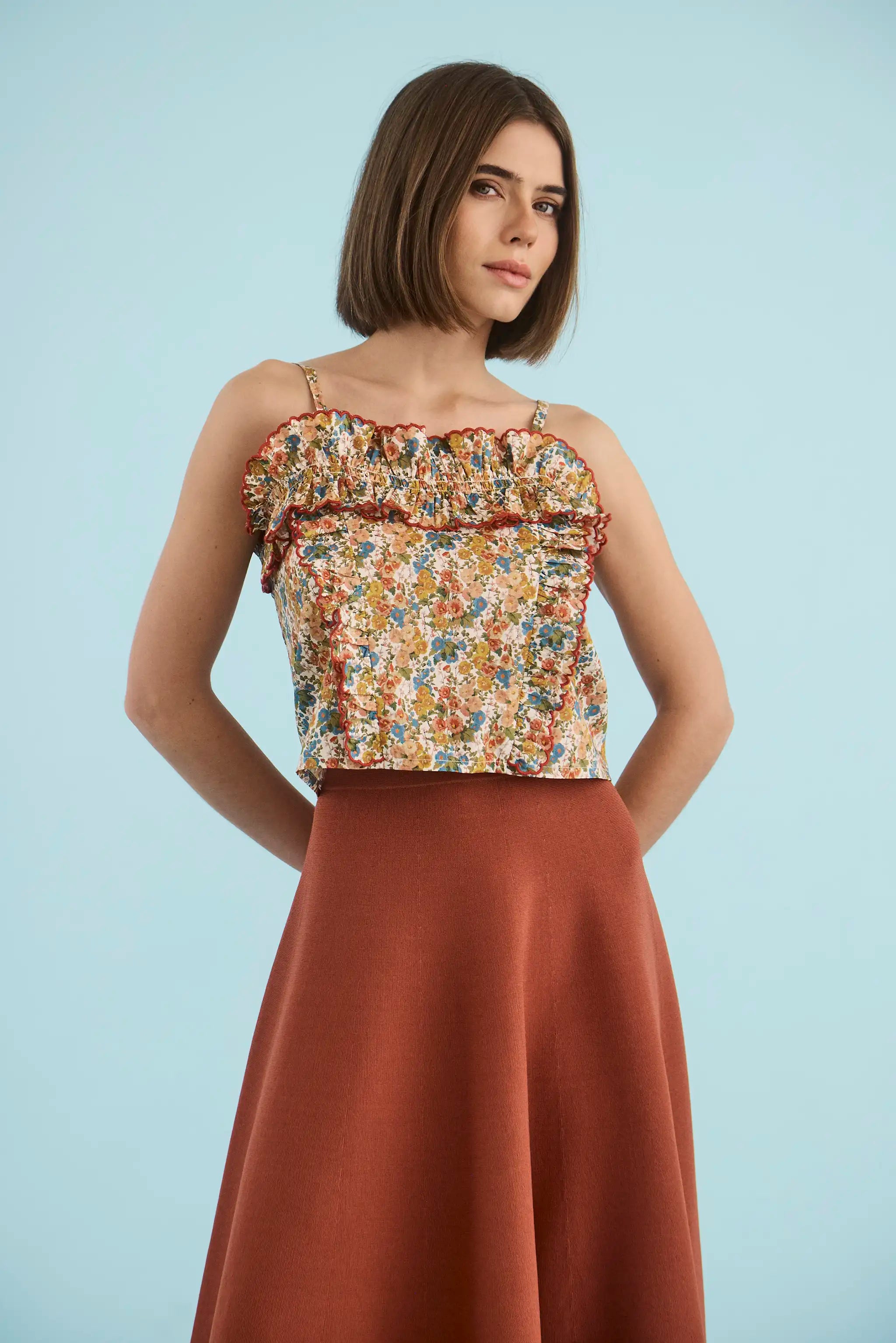 The Elwood Cami in Gertrude paired with the Joan Skirt in Rust. 