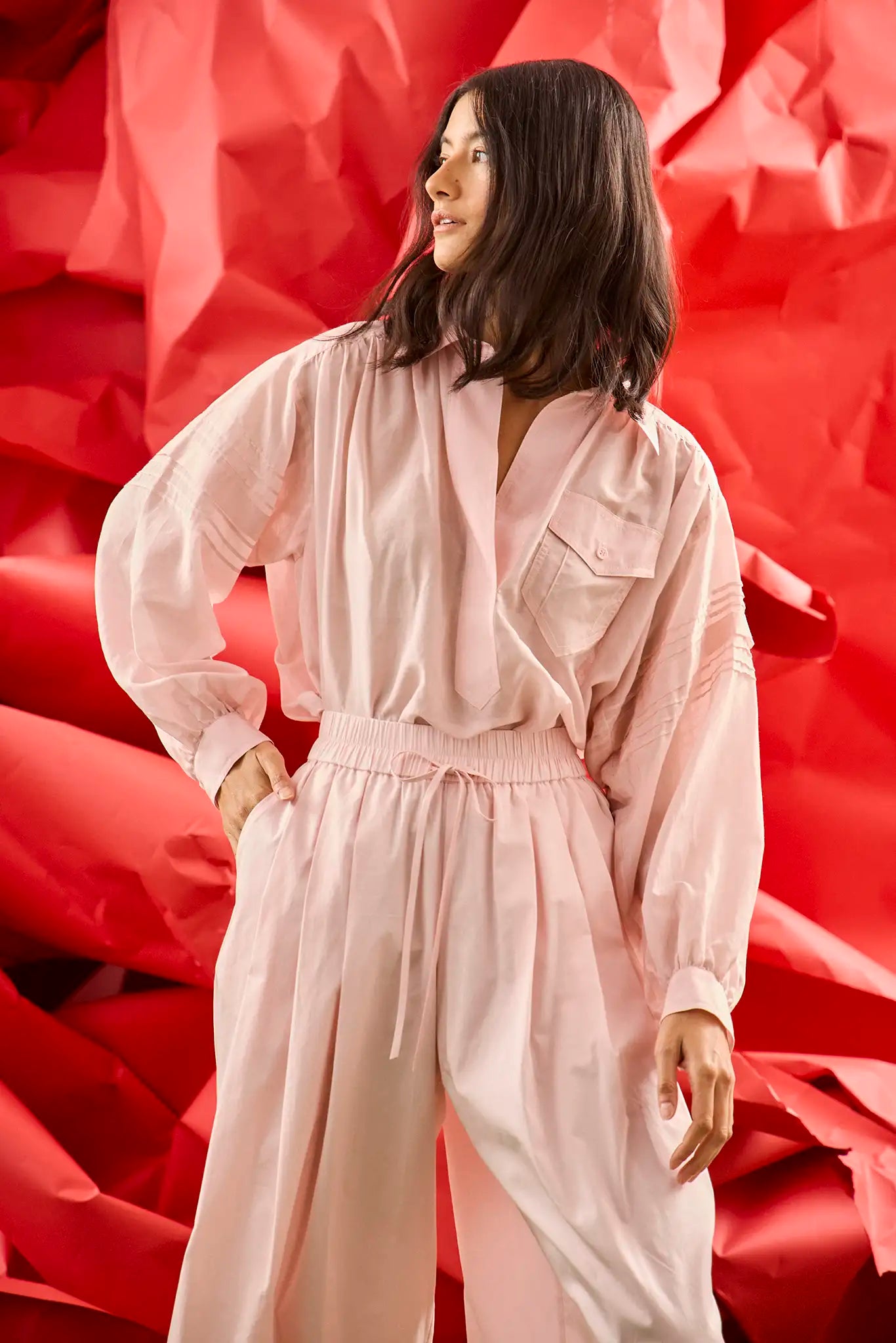 The Whisper Pant in Pink Sand paired with the matching Evangeline Shirt.