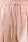 Close up of the Whisper Pant in Pink Sand.