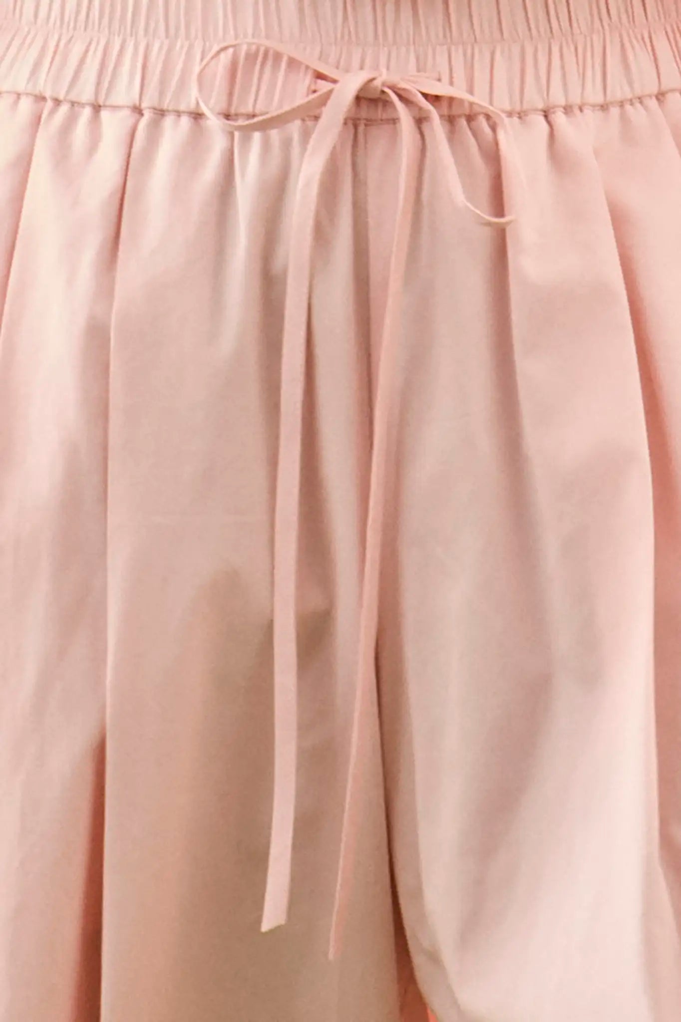 Close up of the Whisper Pant in Pink Sand.