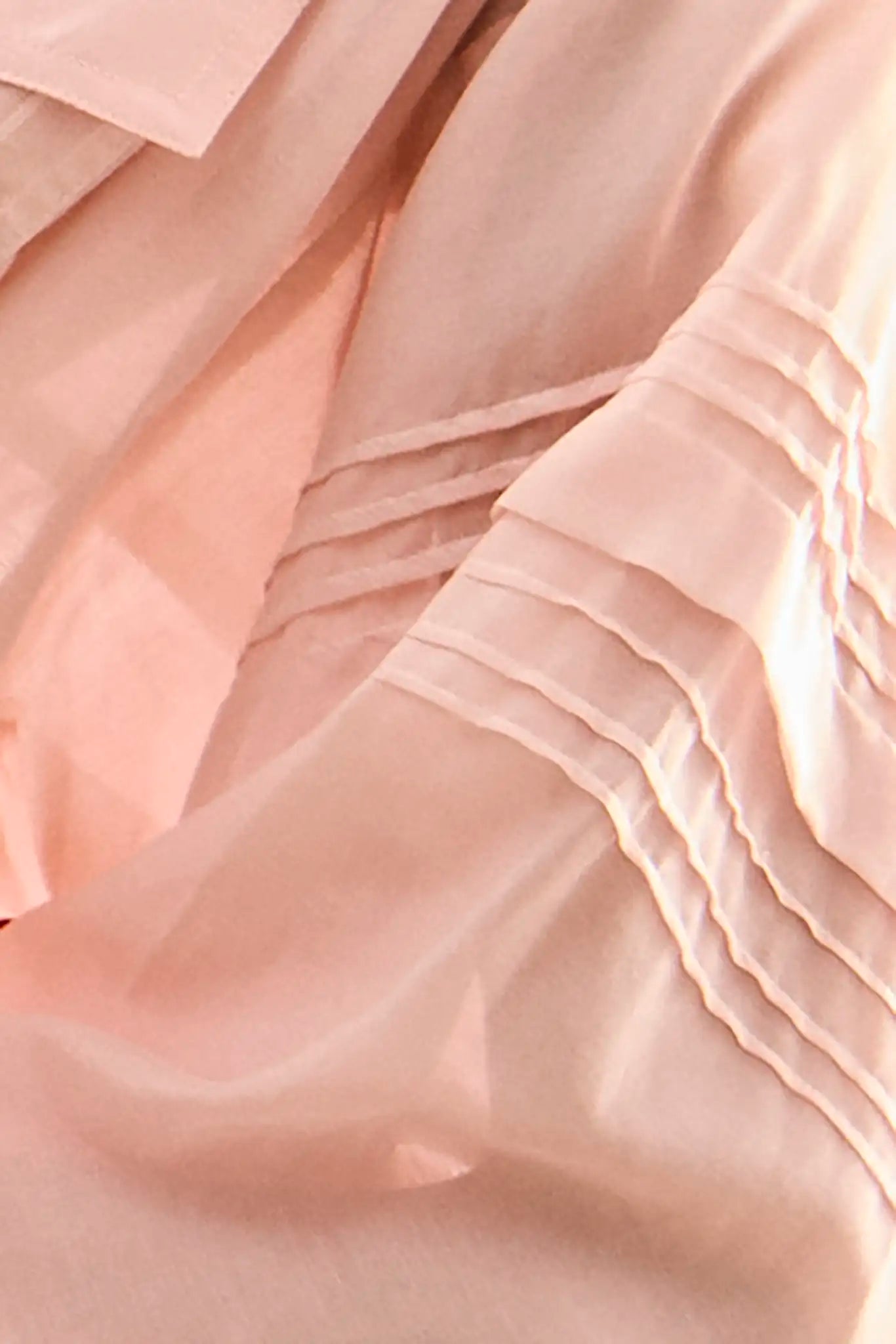 Close up of the Evangeline Shirt in Pink Sand.