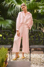 The Whisper Pant in Pink Sand paired with the matching Evangeline Shirt.