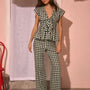 The Everly Top with matching Juno Pants in Hamilton Check paired with pale yellow shoes.