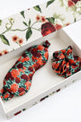 Crimson Blossom eye mask and scrunchie in the Camellia gift box.