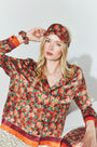 The Blossom Eye Mask & Scrunchie in Crimson Blossom paired with the matching Roxy Top.