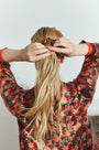 The Blossom Eye Mask & Scrunchie in Crimson Blossom paired with the matching Roxy Top.