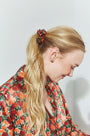 The Blossom Eye Mask & Scrunchie in Crimson Blossom paired with the matching Roxy Top.