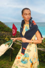 The Faith Dress in Wish You Were Here print paired with St. Georges Sweater.