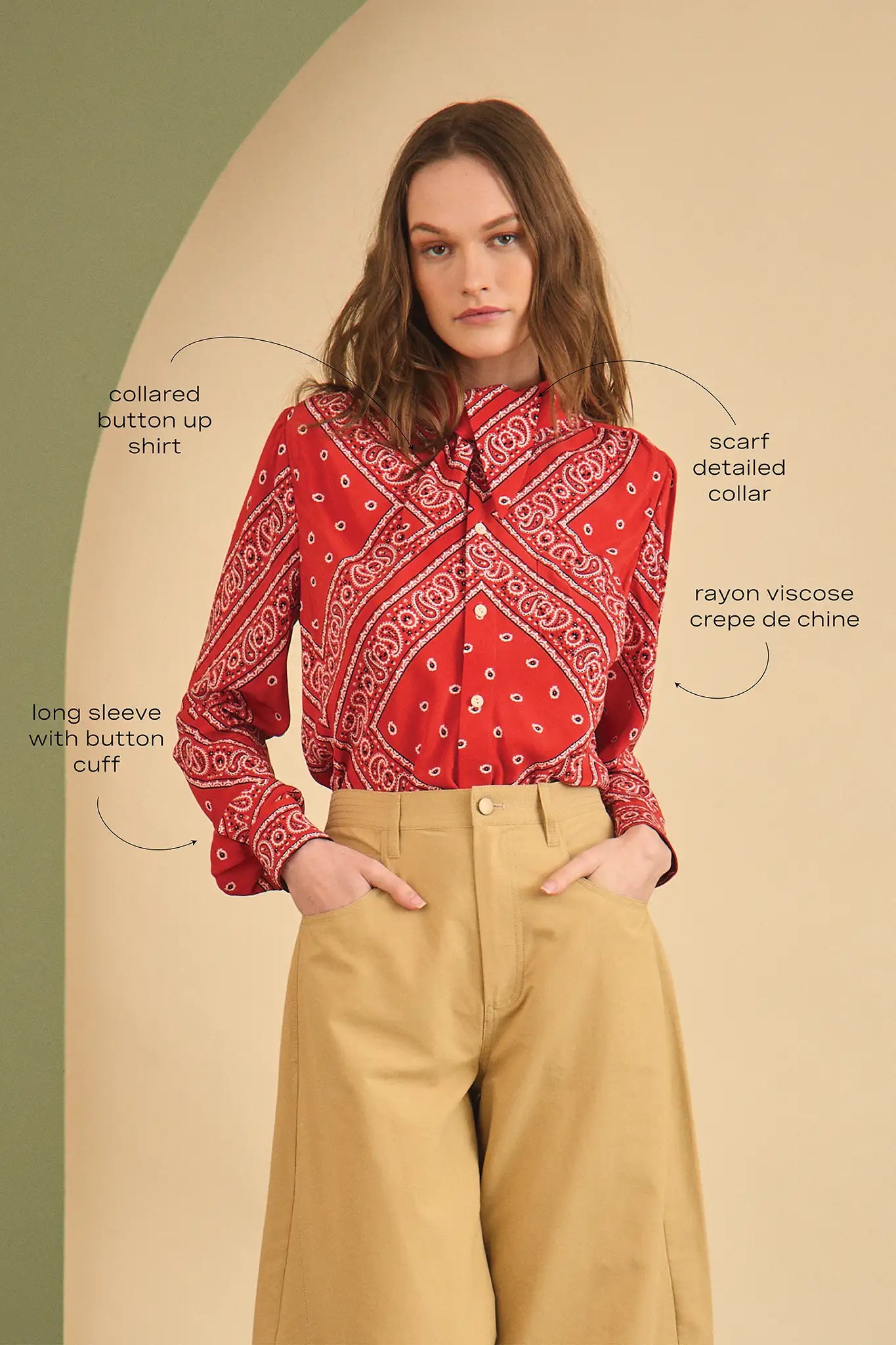 The Frances Top has a button front, long sleeves, button cuffs and a scarf collar detail.