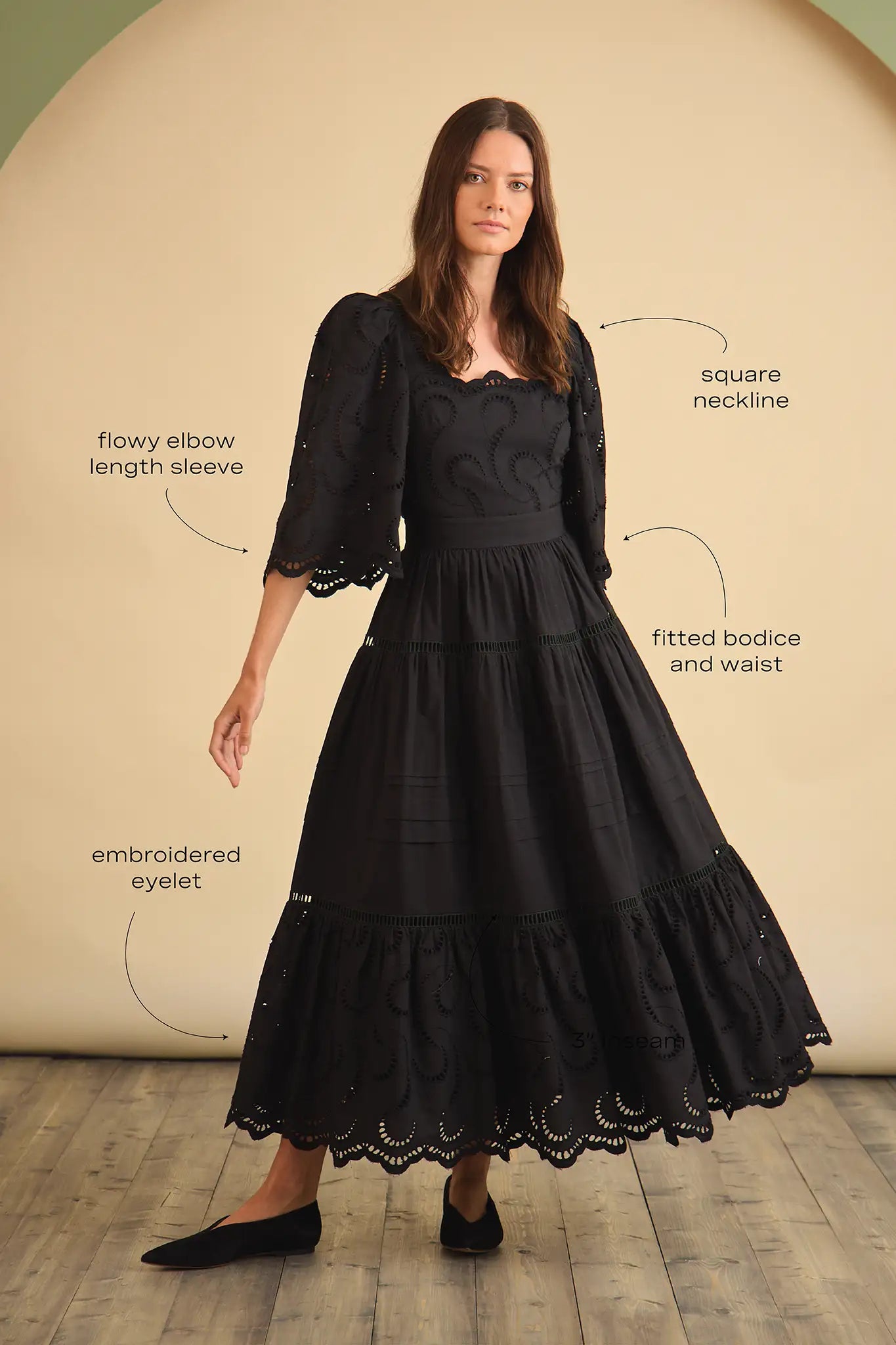 The Zadie Dress has a square neckline, flowy elbow-length sleeves, a fitted bodice and a full skirt.