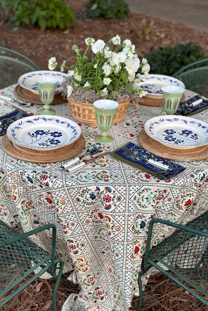 Elevate your dining experience with Hunter Bell's exquisite Cream Trellis patterned tablecloth.