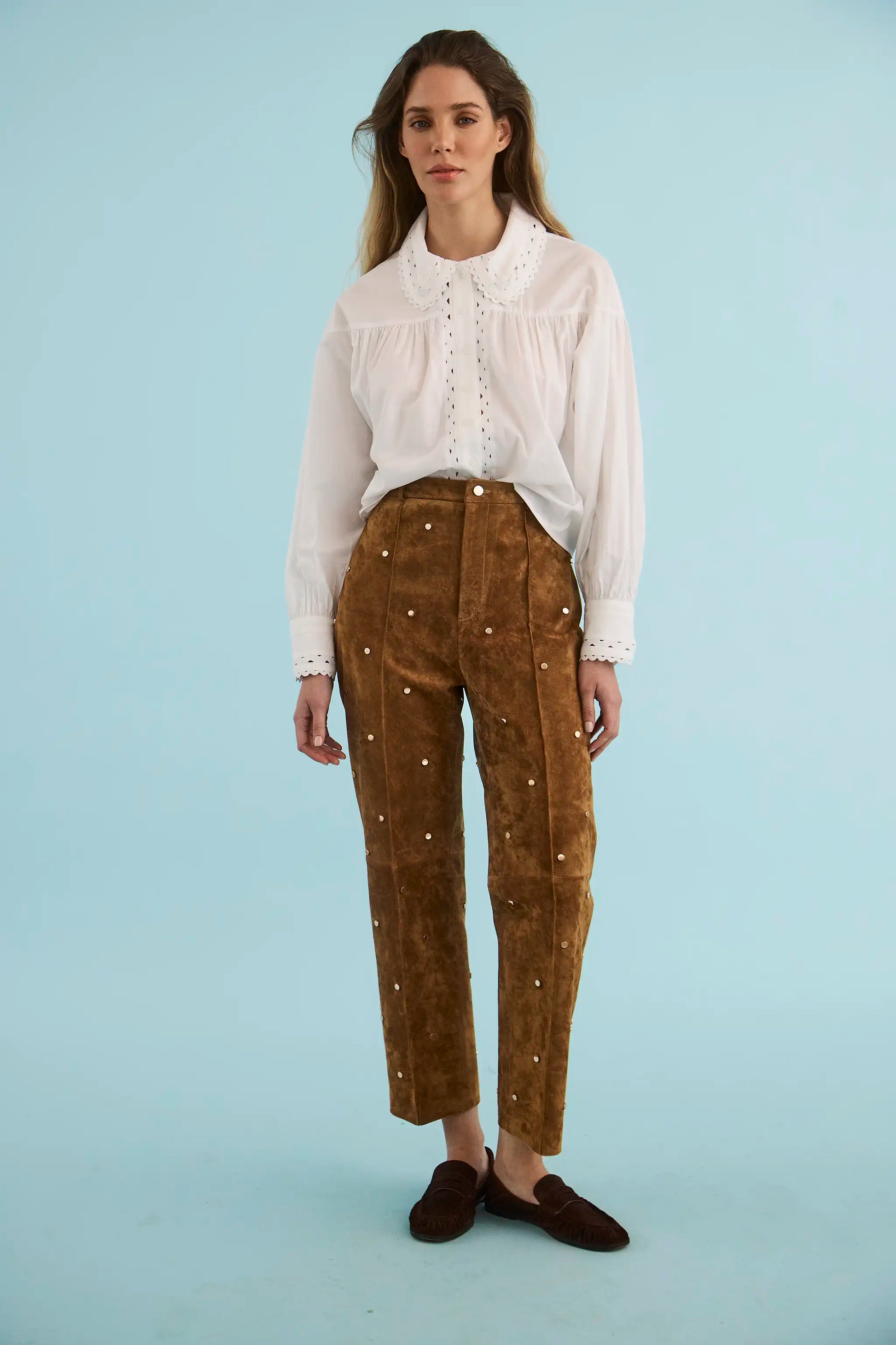 The Finch Top in White paired with the Hills Pant in Saddle. 