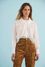 The Finch Top in White paired with the Hills Pant in Saddle. 
