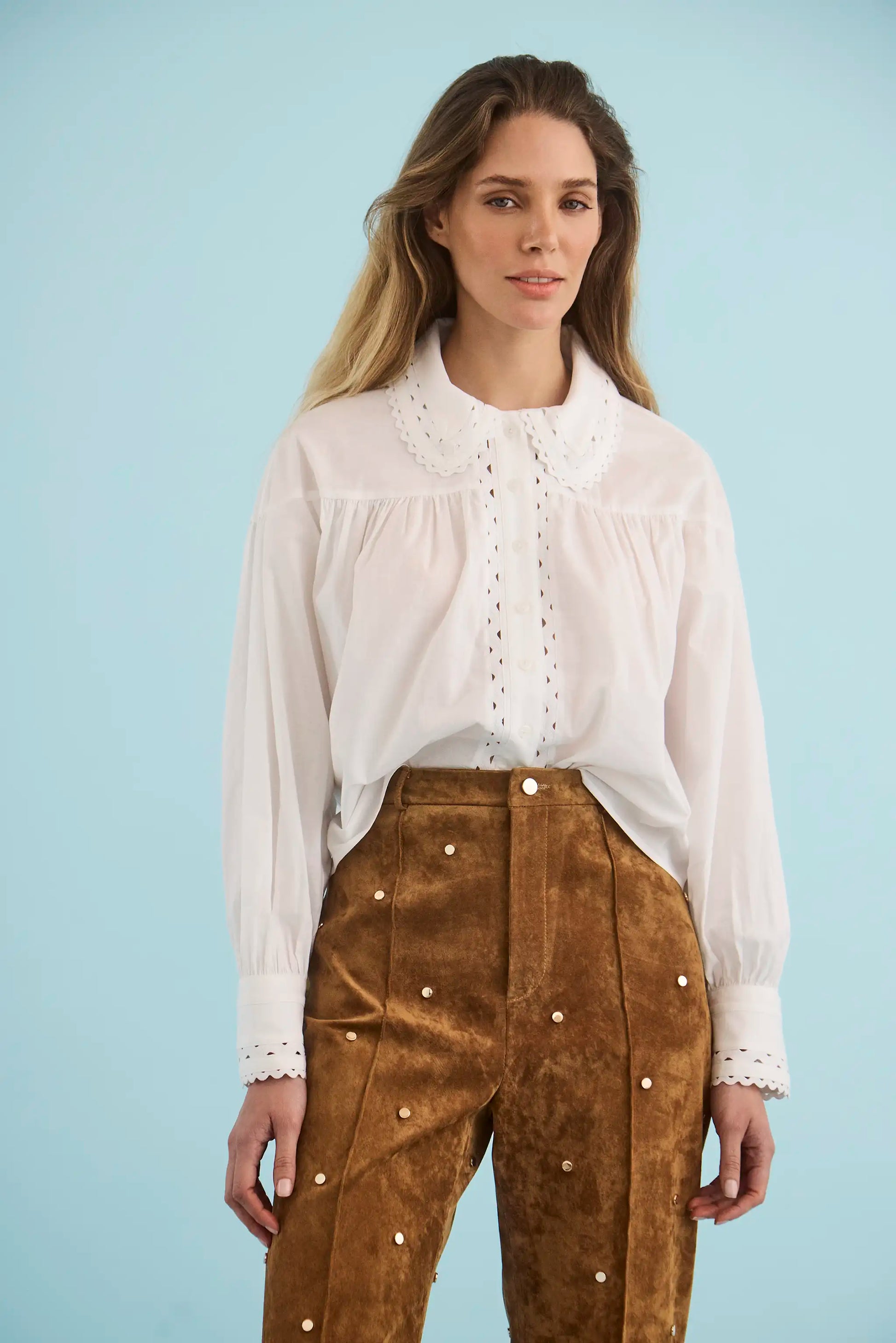 The Finch Top in White paired with the Hills Pant in Saddle. 