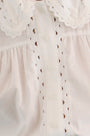Close up of the Finch Top in White. 