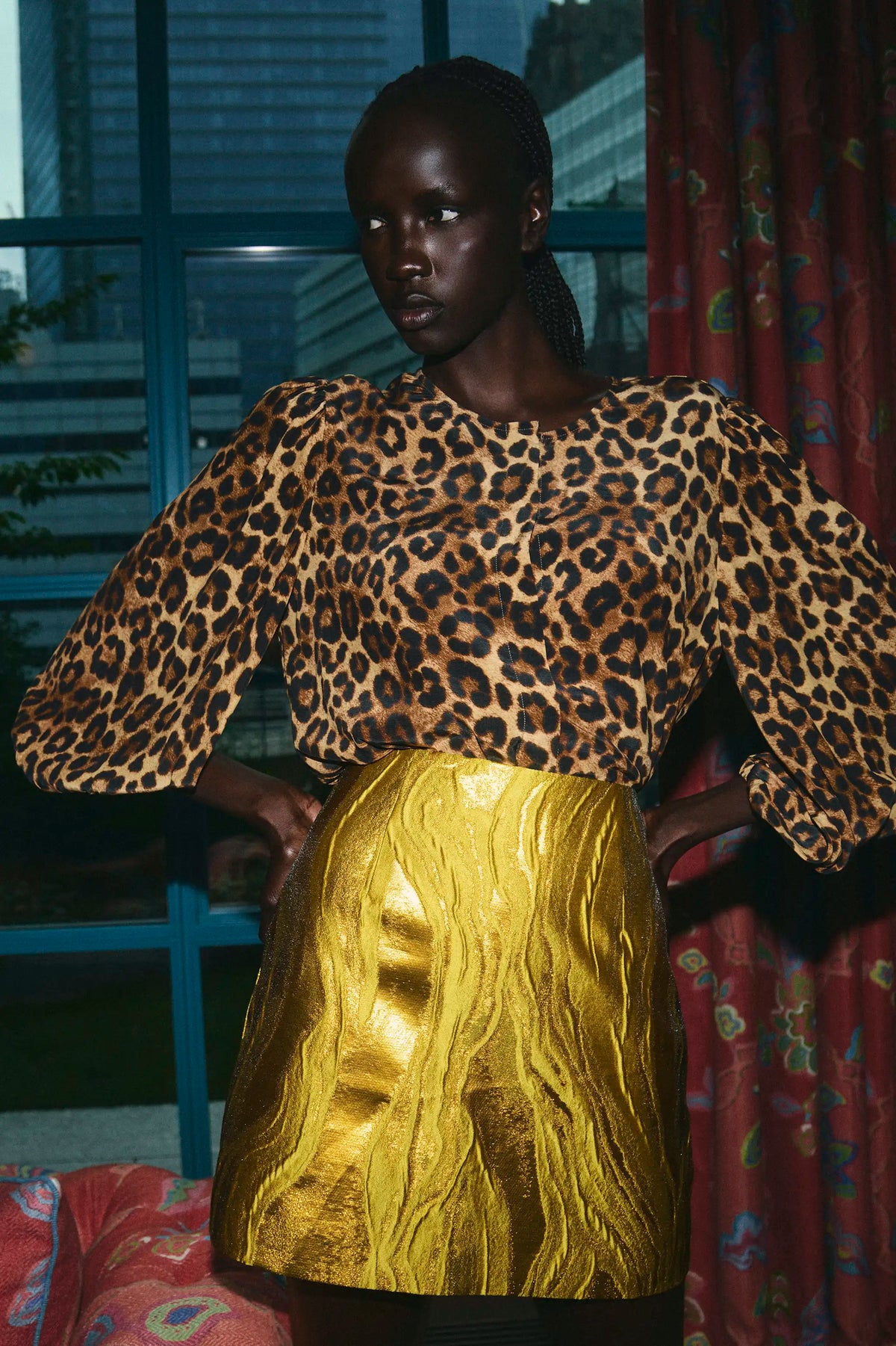 The Finley Blouse in Soho Leopard Camel paired with the Britt Mini Skirt in Gilded Jacquard.