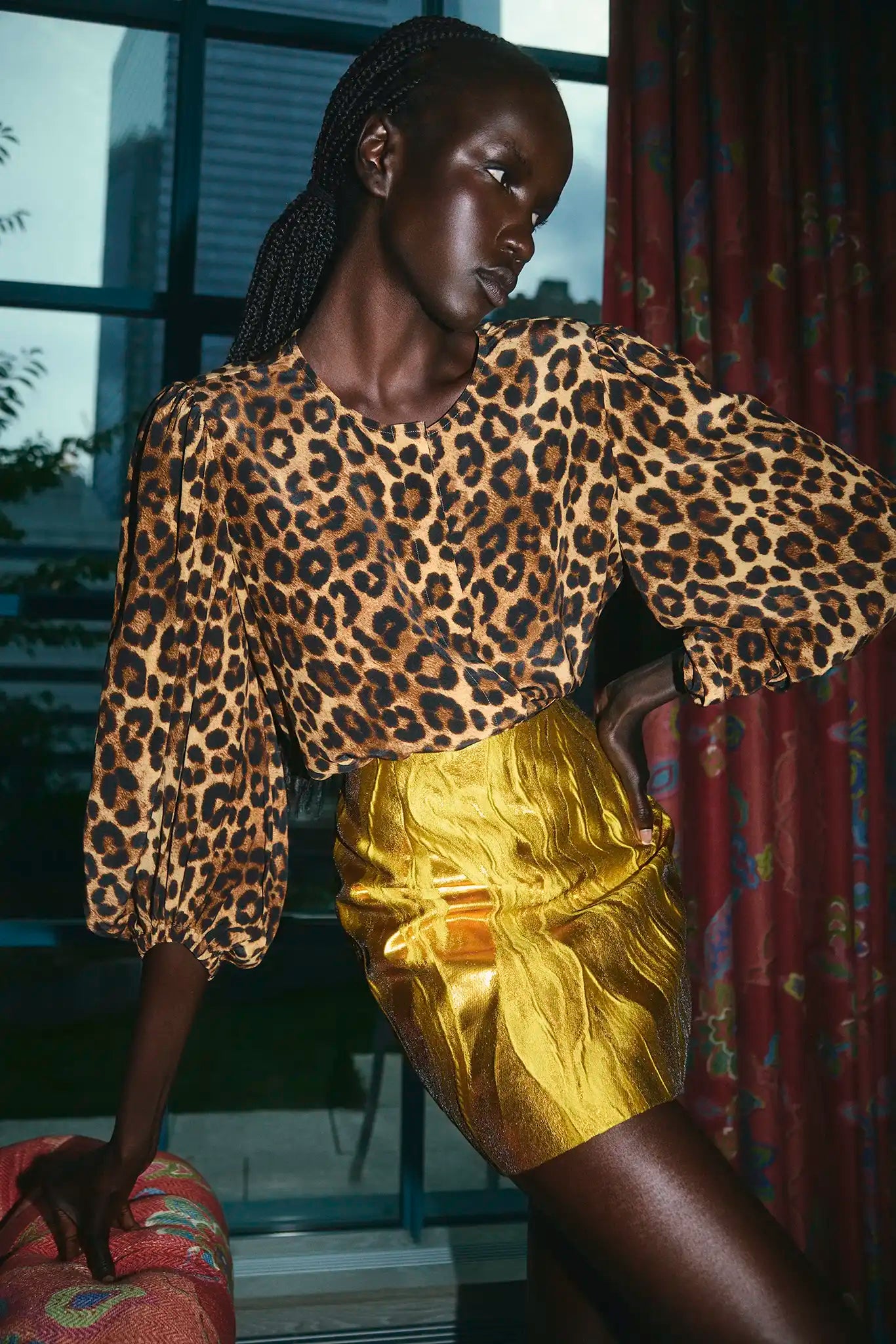 The Finley Blouse in Soho Leopard Camel paired with the Britt Mini Skirt in Gilded Jacquard.