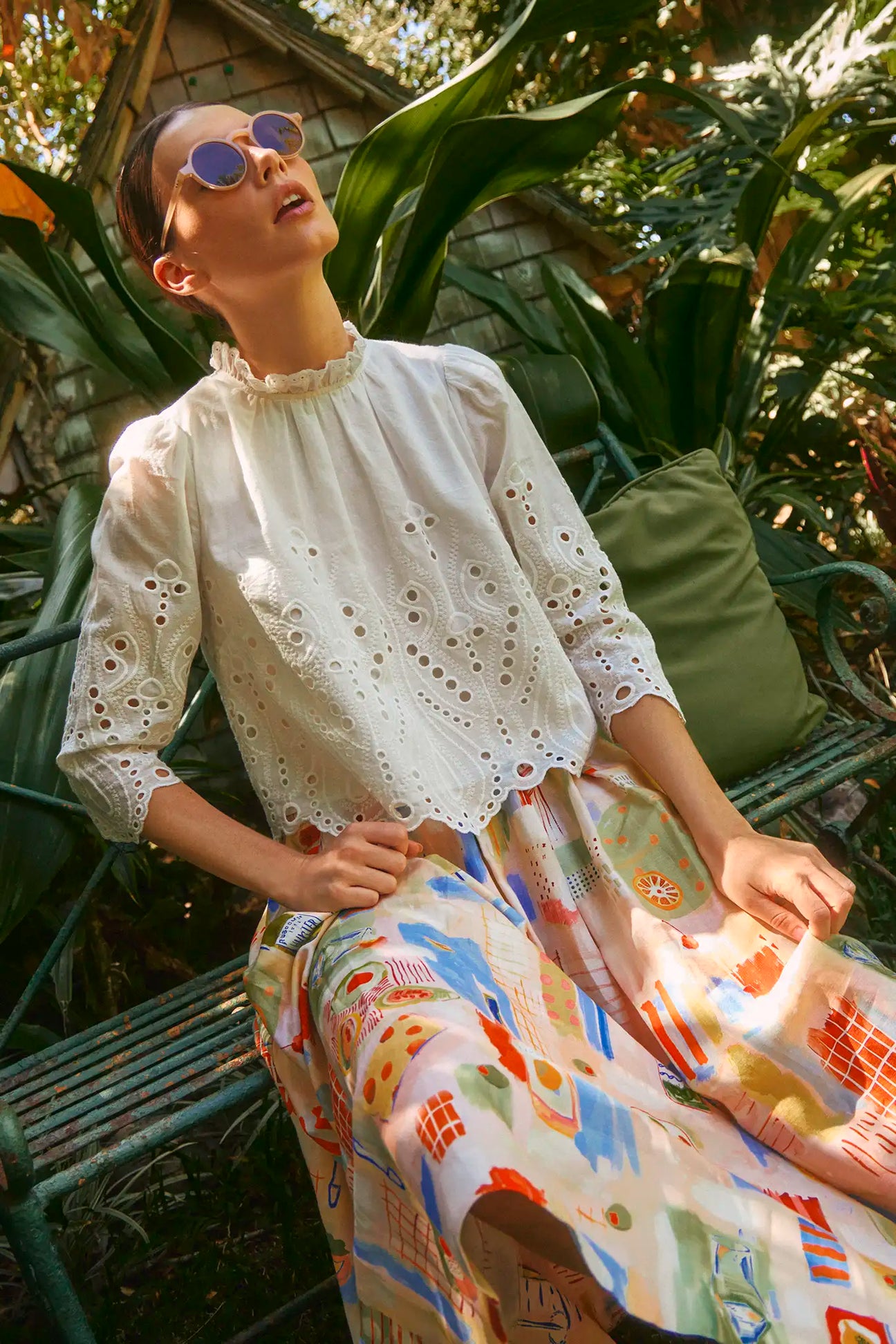 a woman sitting on a bench