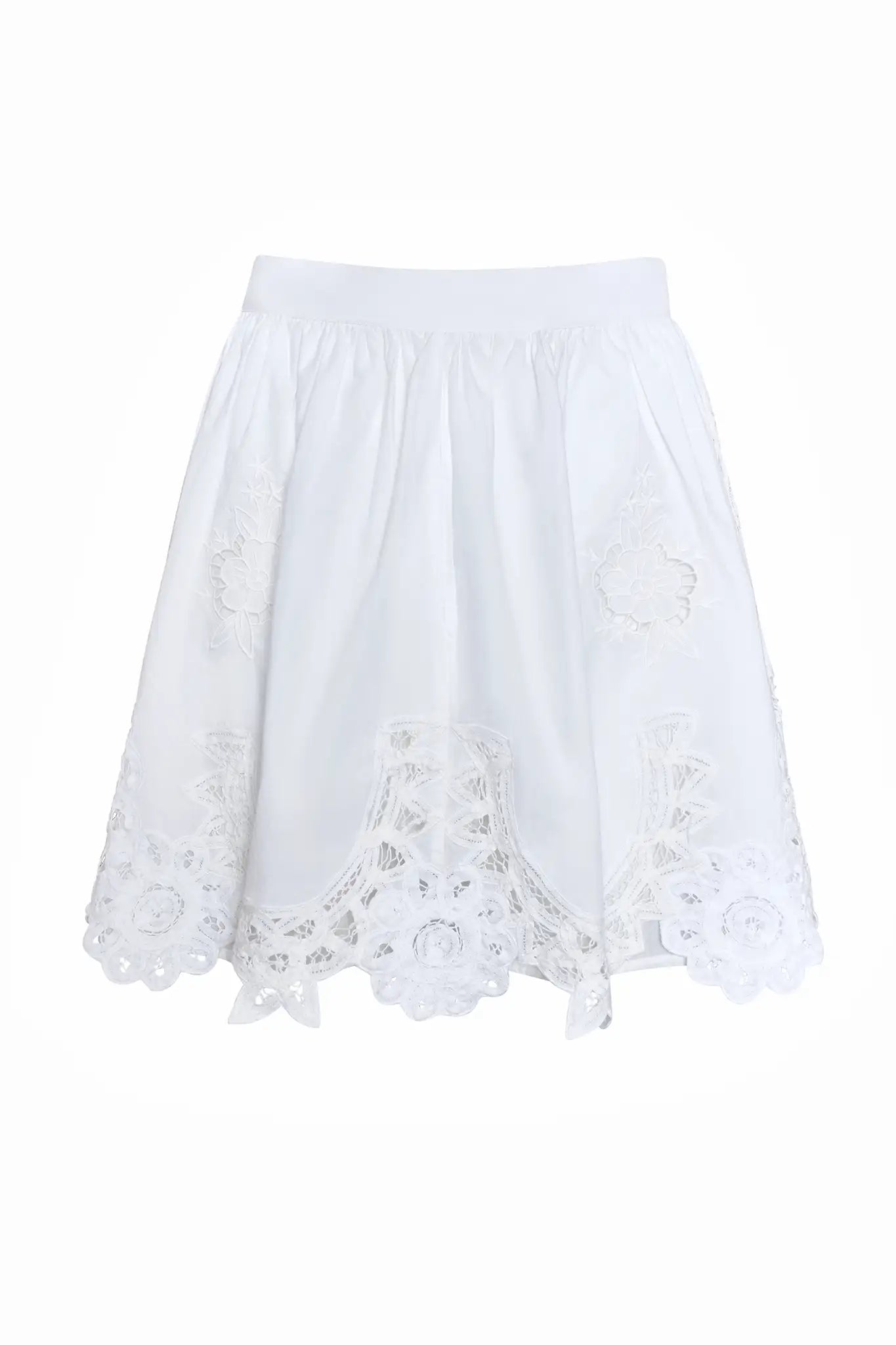 The Corrine Mini Skirt is in Battenberg white lace, clean waistband, and side-seam pockets.