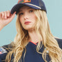 The Hunter Bell x Freya Trucker Hat in Navy paired with navy soccer jersey.