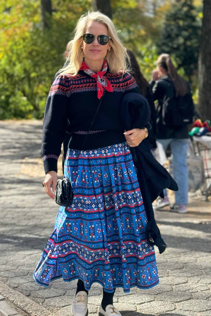 Hunter wearing the Jackie Sweater and Tatum Skirt in New York.