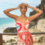 The Capri One Piece in Lost at Sea paired with matching Paloma Wrap Skirt.