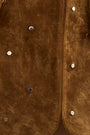 Close up of the Dottie Mini Skirt in Saddle. 