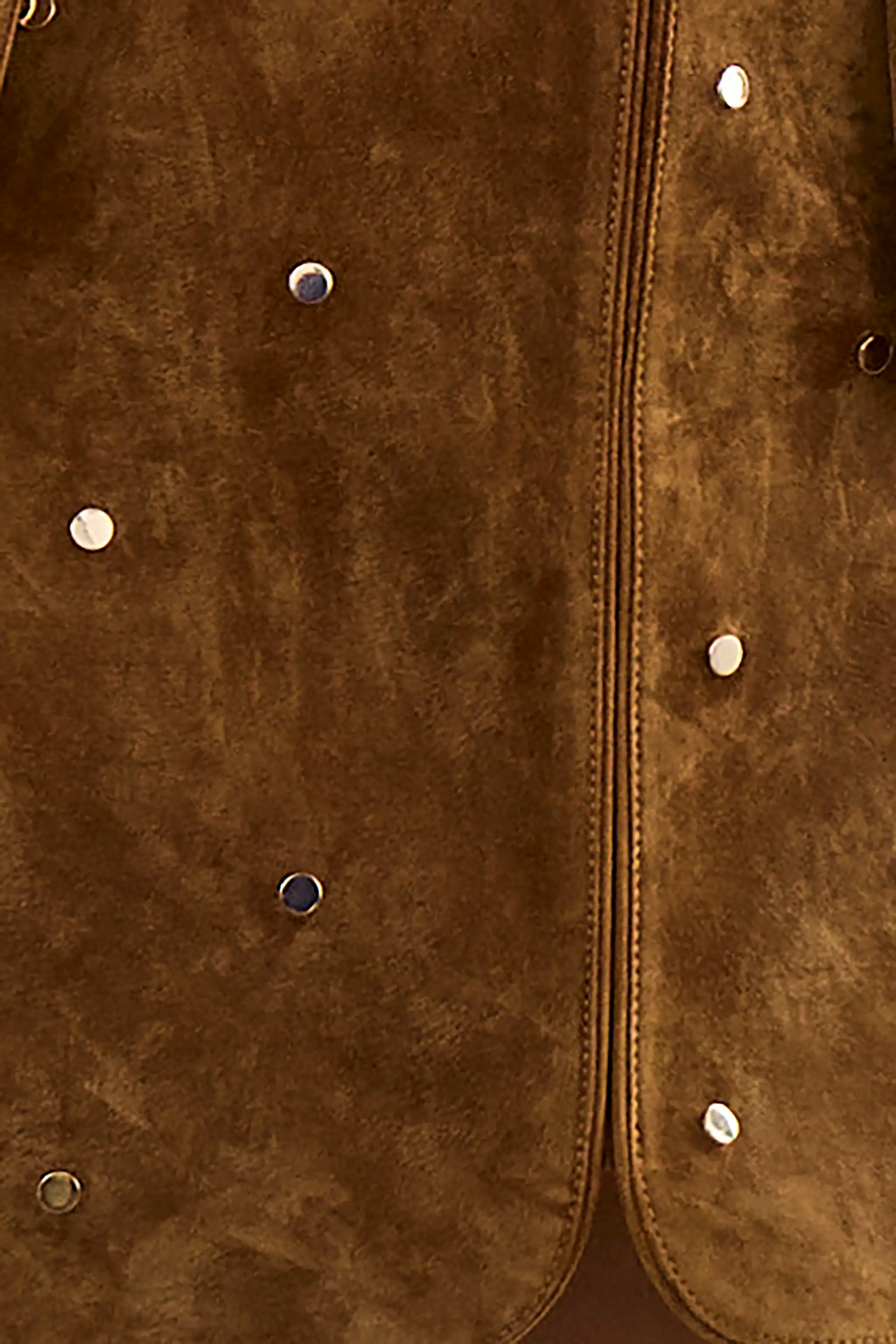Close up of the Dottie Mini Skirt in Saddle. 