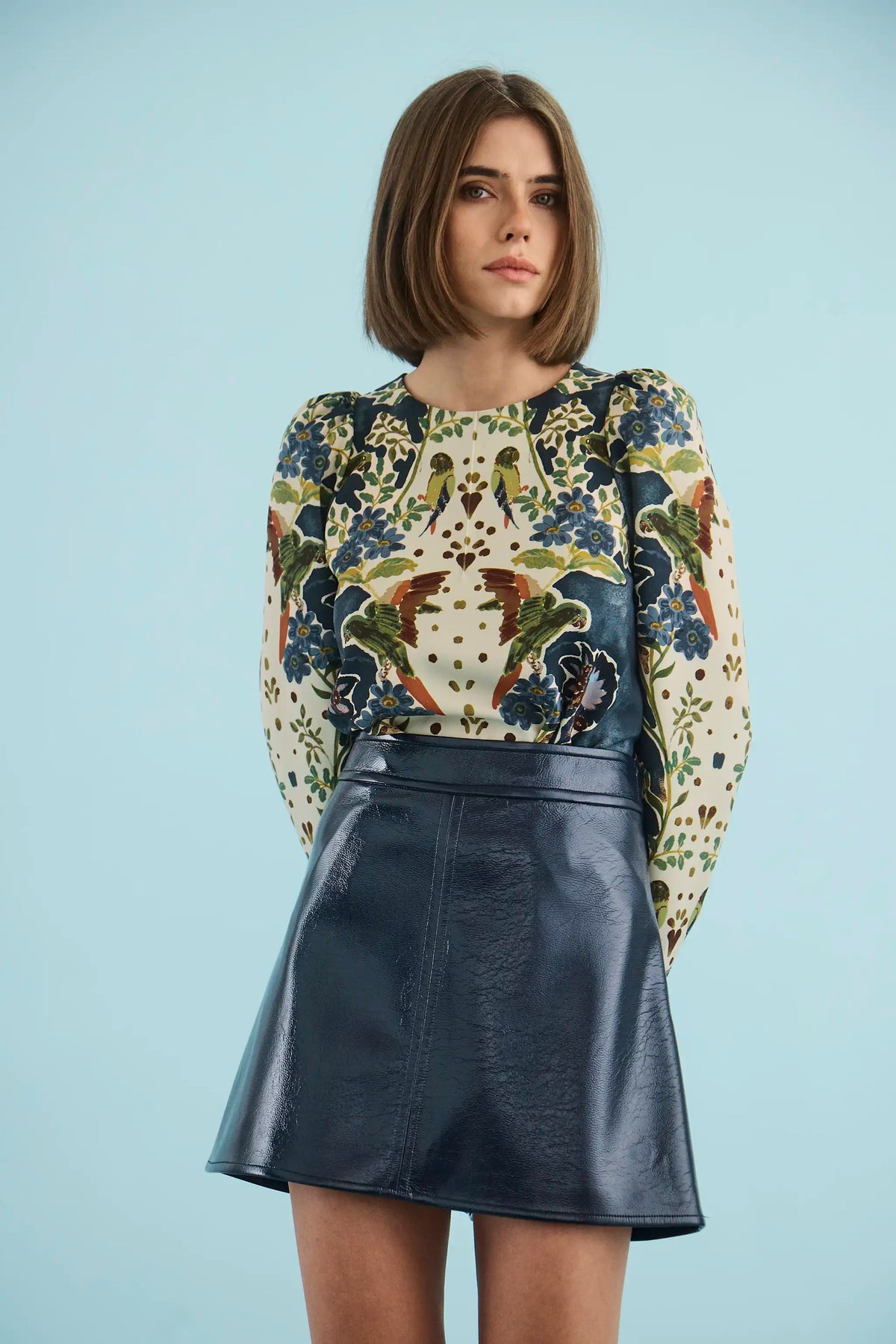 The Harris Top in Birds of a Feather Navy paired with the Meeghan Mini Skirt in Navy. 