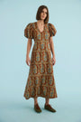 The Harrison Dress in Amber Glen Brown. 